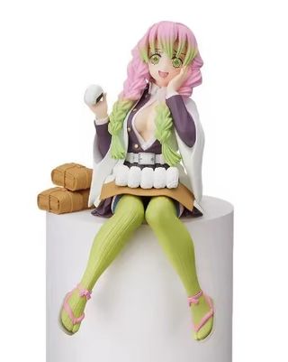 Figuras de Demon Slayer comiendo bolas de arroz