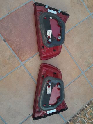 Pilotos traseros Kia Sportage