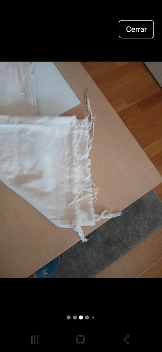 Vaqueros Bershka beige flecos