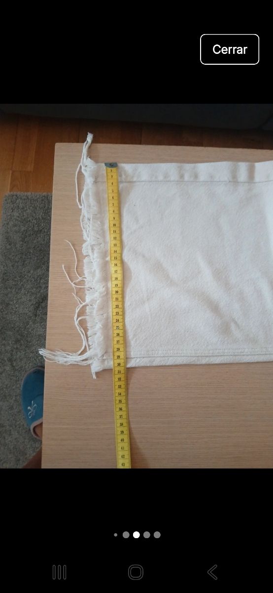 Vaqueros Bershka beige flecos