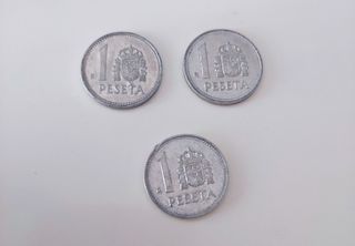 3 Monedas de 1 peseta.