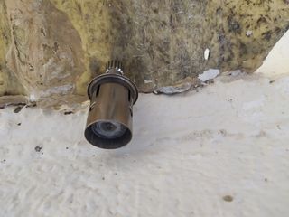 Mechero metálico antiguo de vehículo, usado. 