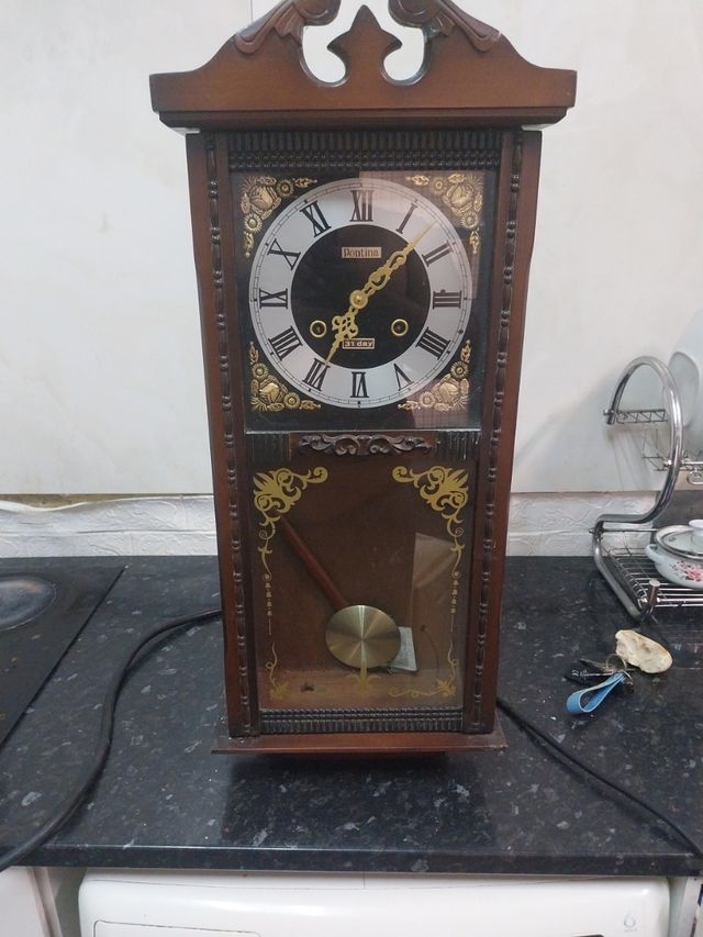 Reloj antiguo de pared