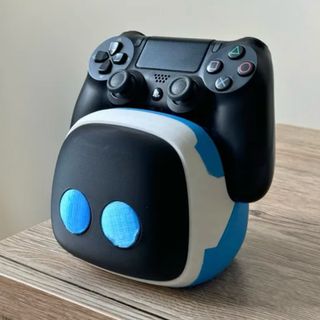 Soporte mando Astro Bot