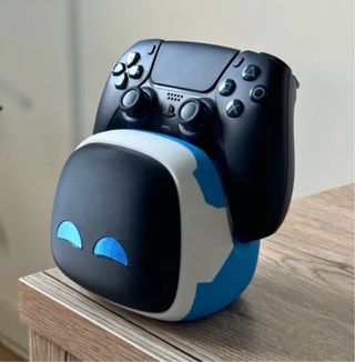 Soporte mando Astro Bot
