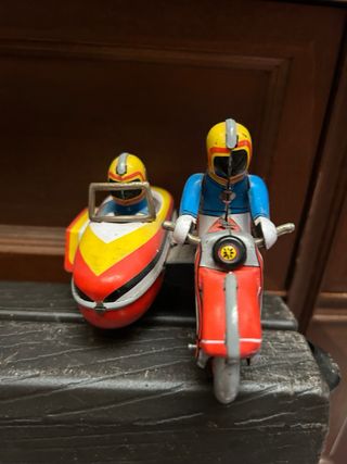 Collezione di 12 giocattoli in latta 