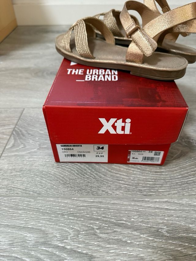 Sandalias niña doradas