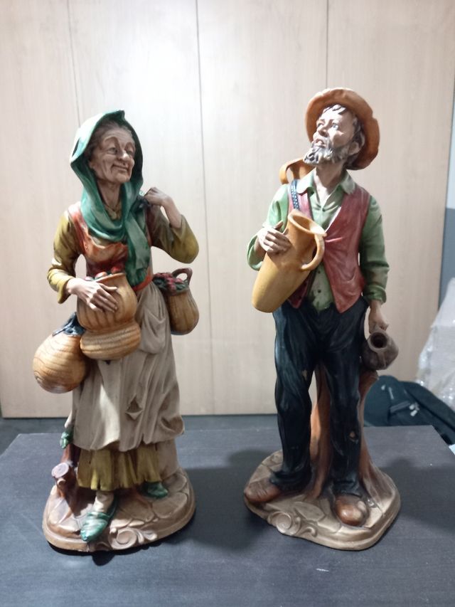 Coppia di figure anziane del marchio