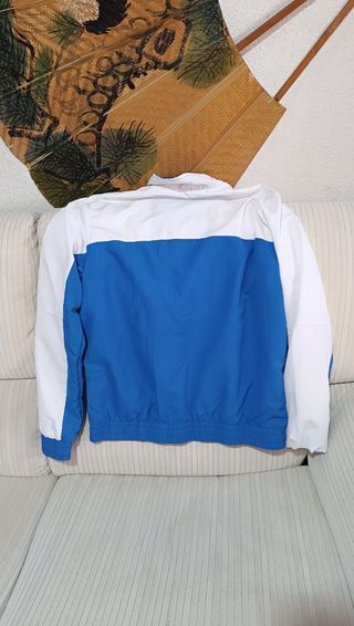 Cazadora Lotto azul y blanca