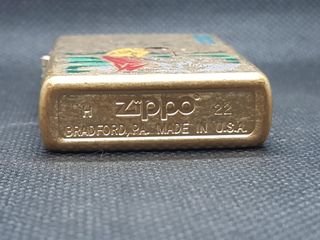 Zippo 2022 Model 49477 Tumbled Brass, Golfer.