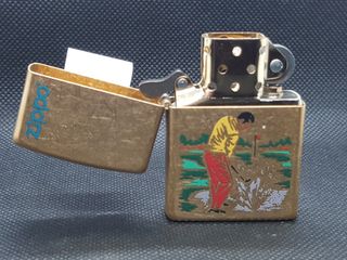 Zippo 2022 Model 49477 Tumbled Brass, Golfer.