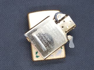 Zippo 2022 Model 49477 Tumbled Brass, Golfer.