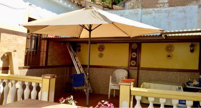 Parasol beige de tela - Sombrilla