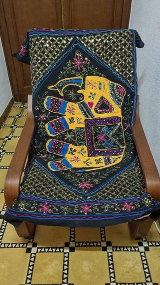 Sillón IKEA Poäng y reposa pies