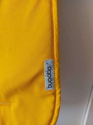 Colchoneta Bugaboo amarilla para silla