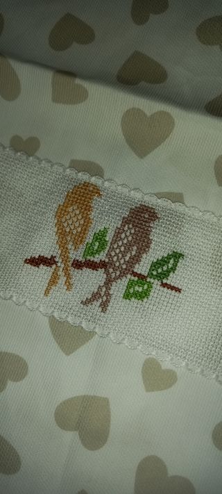 Sacchetto ricamato portacorredino