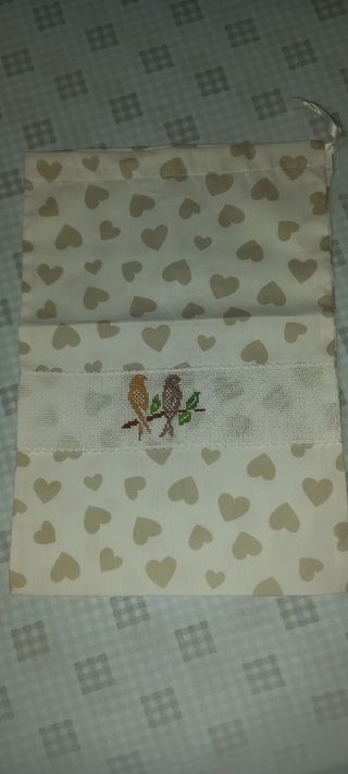 Sacchetto ricamato portacorredino