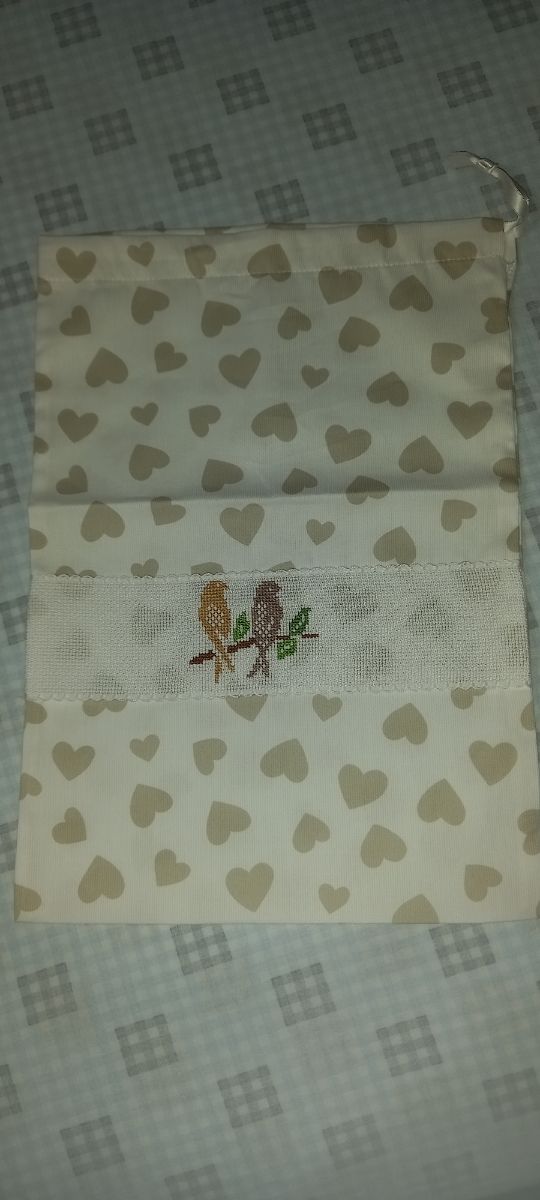 Sacchetto ricamato portacorredino