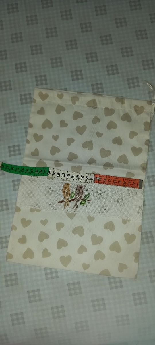 Sacchetto ricamato portacorredino