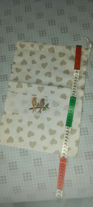 Sacchetto ricamato portacorredino