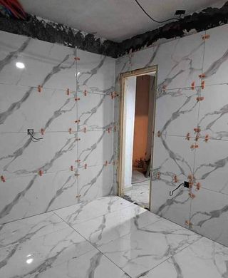 Azulejos mármol-Reforma baño albanel fachadas yeso