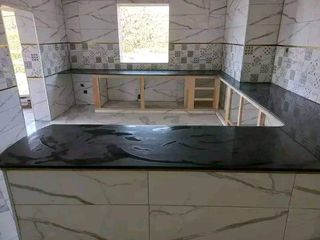 Azulejos mármol-Reforma baño albanel fachadas yeso