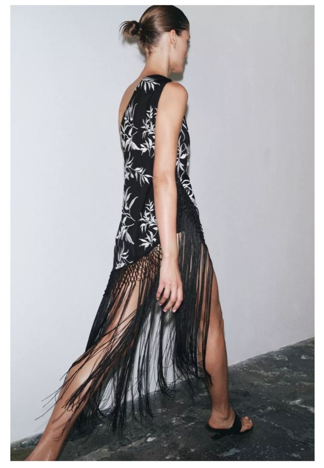 Top asimétrico flecos ZARA