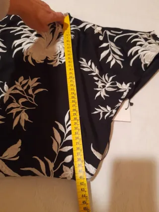 Top asimétrico flecos ZARA