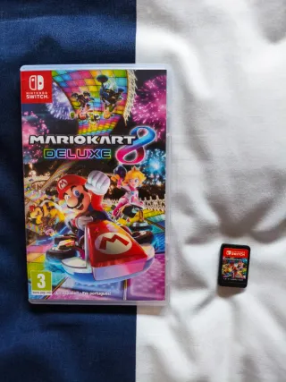 Nintendo Switch Roja + Mario Kart 8 Deluxe + funda