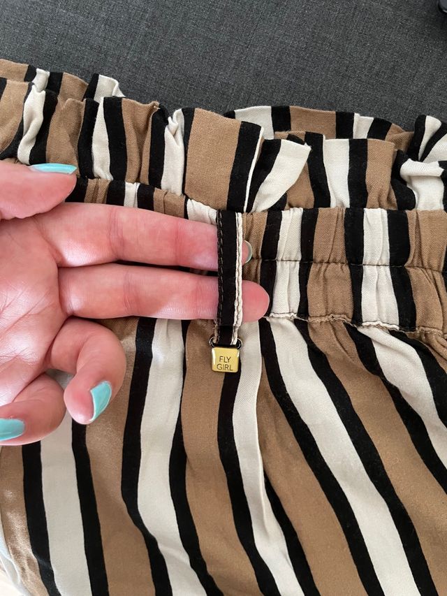 Shorts righe marroni bianchi