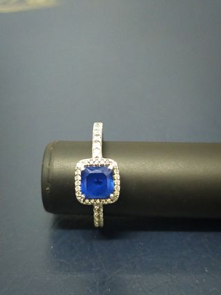 Anillo Pandora plata talla 16
Piedra azul
