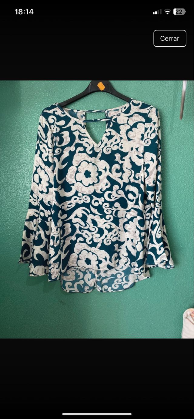 Blusa turquesa estampada