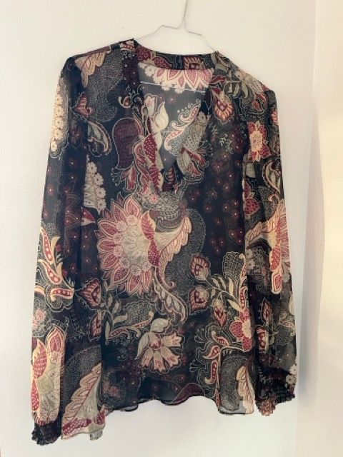 Blusa trasparenza fiori