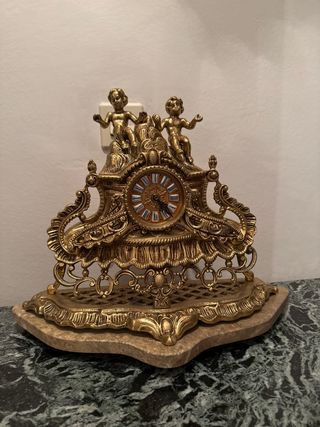 Reloj dorado antiguo