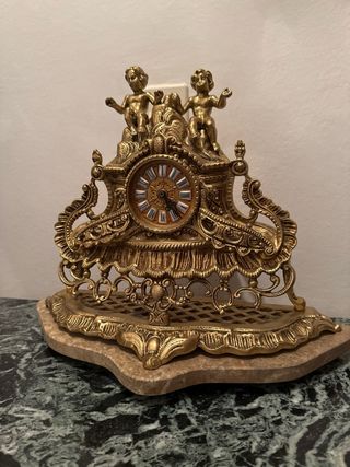 Reloj dorado antiguo