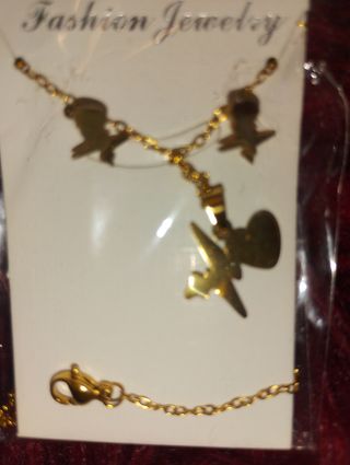 Pulsera y aretes corazón oro
