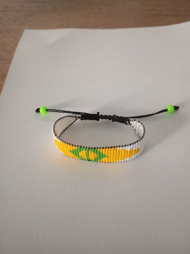 Pulsera tejida multicolor