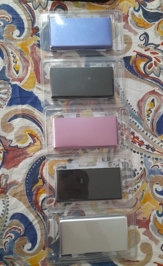 NUEVO. Funda Oficial metal y policarbonato DS Lite