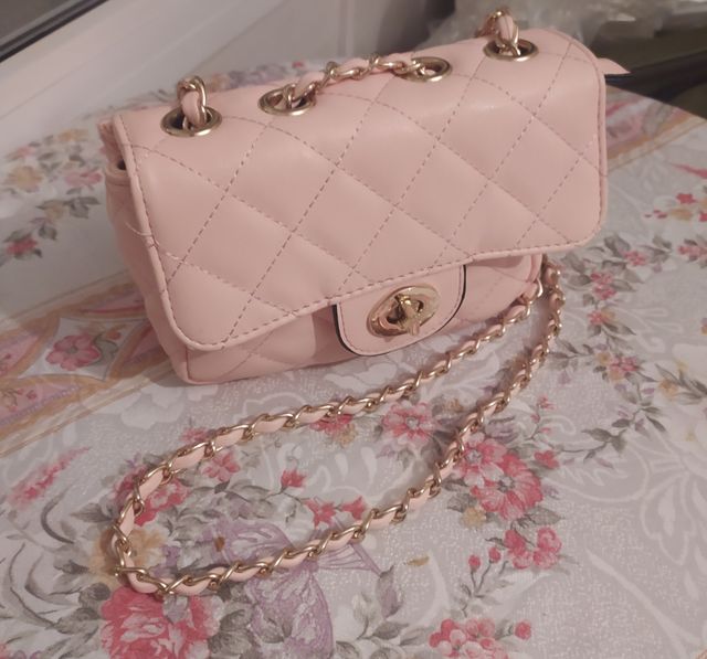 Bolso bandolera rosa pastel