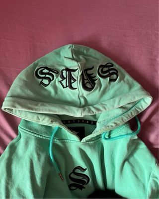 Sudadera sinners attire turquesa
