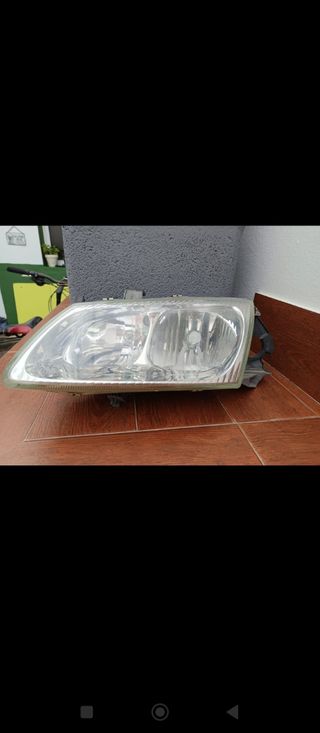 Faro Nissan Almera N16 (izquierdo)