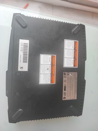 Xbox clásica negra con mando