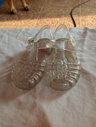 Sandalias niña rosa transparentes