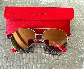Gafas sol Guess doradas