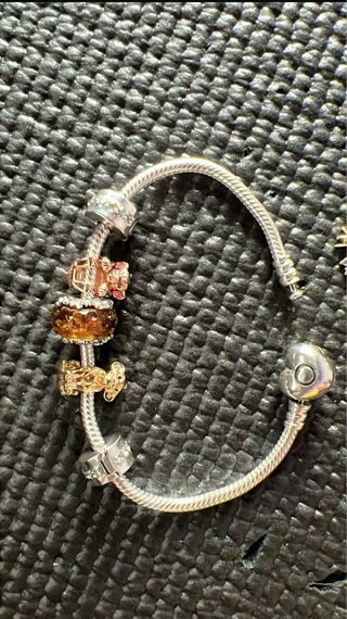 Pulsera Pandora plata-oro
Precio por separado