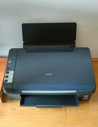 Impresora Epson + 9 cartuchos