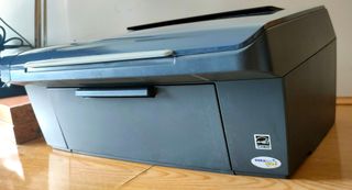 Impresora Epson + 9 cartuchos