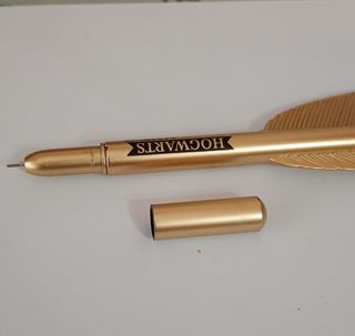 Pluma estilográfica Hogwarts dorada