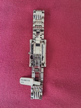 Reloj Jaguar dorado y plateado