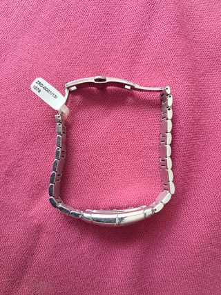 Reloj Jaguar dorado y plateado